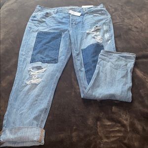 Distressed High Rise Vintage Jeans with Patches.